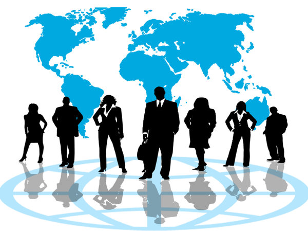 Business Network: Business team against a blue world map