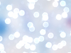Bokeh or Blurred Lights 16: Bokeh, or blurred background lights inin blue and white. Suitable for a background, Christmas greetings, holiday greetings, texture, or fill.