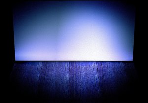 Stage Backdrop 7: A wall and floor with lighting effects that could be a stage, shelf or empty room. You may prefer this:  http://www.rgbstock.com/photo/nWlZB9c/Stage+Backdrop+5