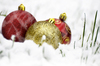 Baubles in snow: Christmas baubles in the snow