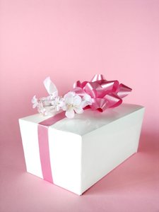 Pink gift: Candy gift box on pink background